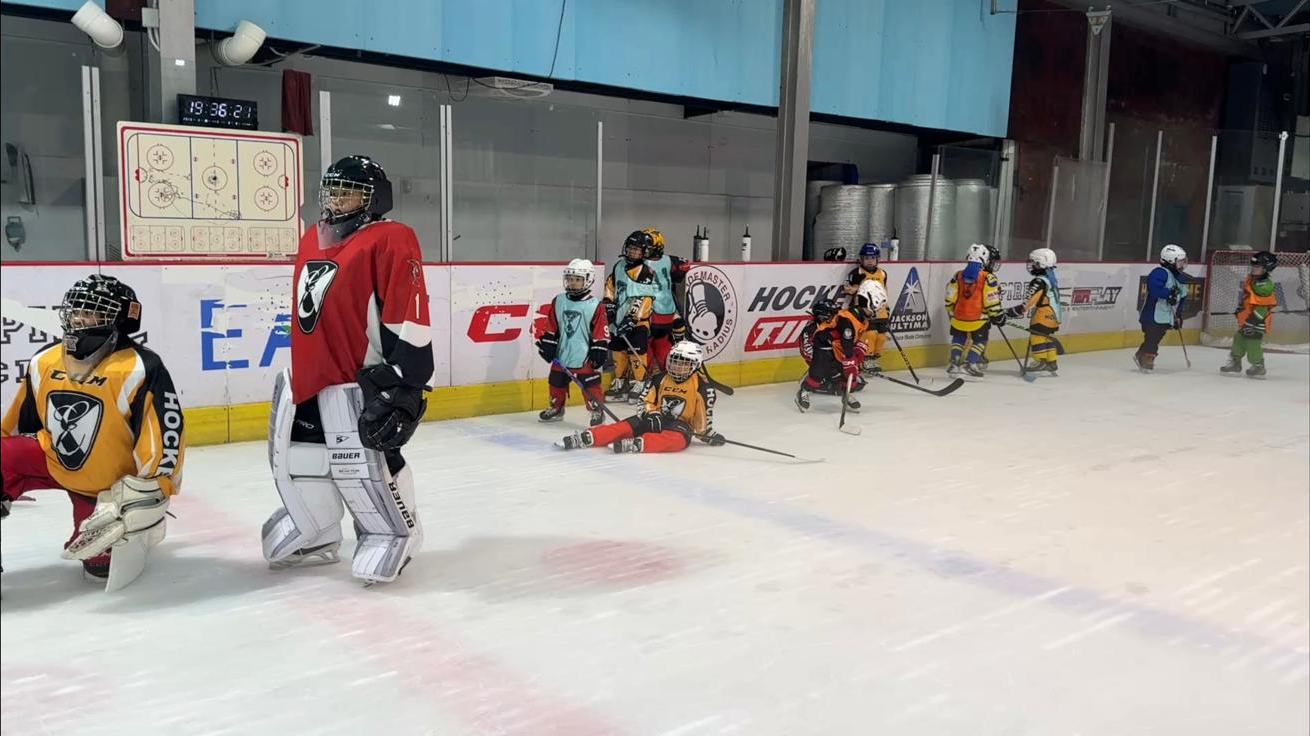 Players on the ice at the Empire Glory tryout