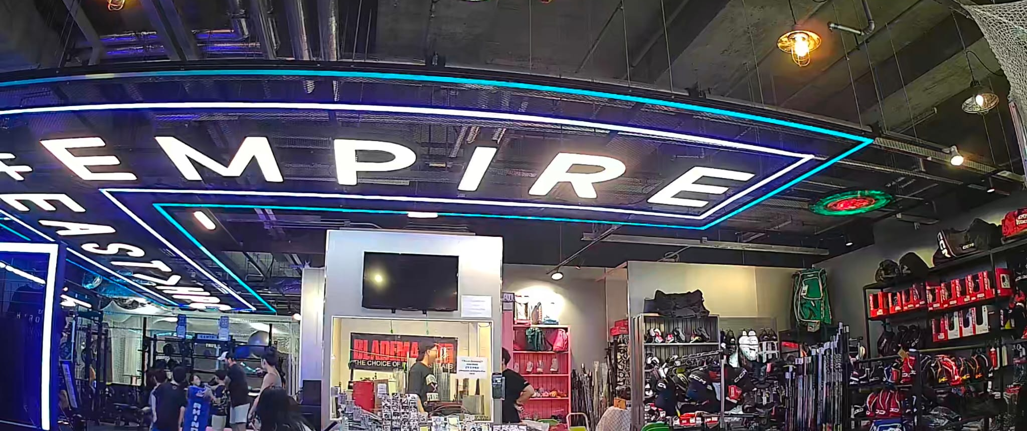 The Empire pro shop at MegaBox under its lit sign